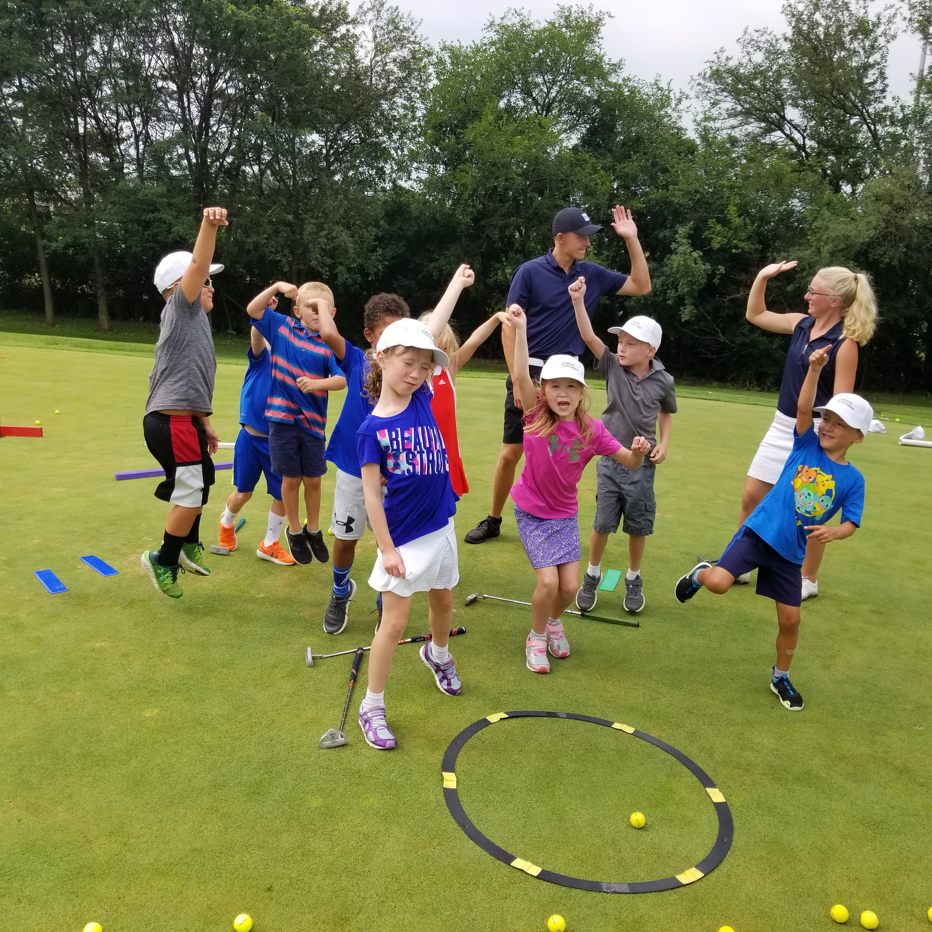 Young golfers celebrating
